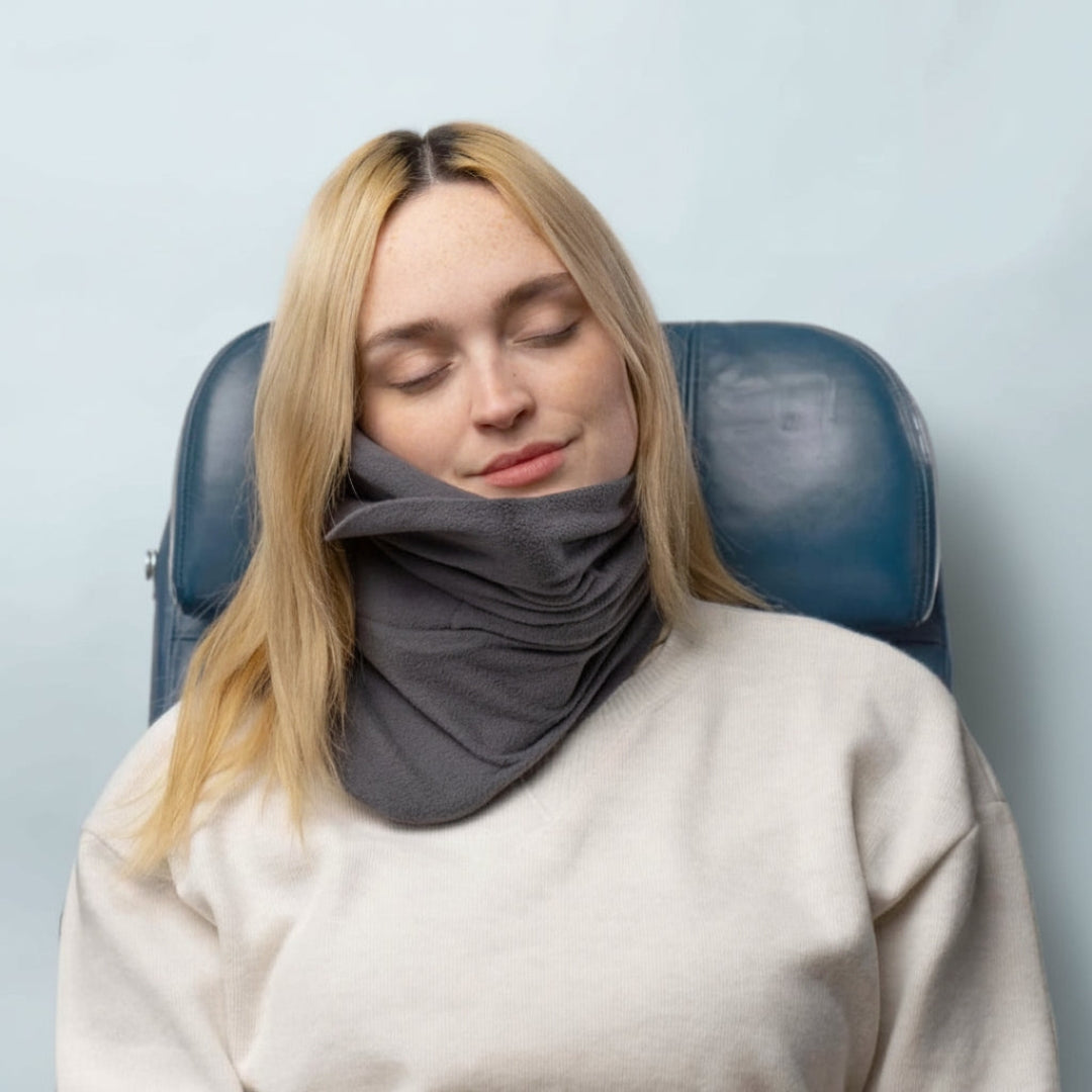 Oreiller de voyage enveloppant pour soutenir la nuque et maintenir une position assise